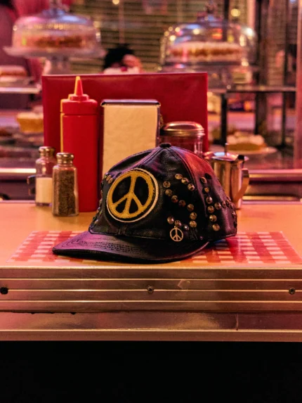 SATOSHI NAKAMOTO STUDDED WRAP AROUND LEATHER CAP